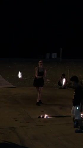 Fire performers light up Batumi's seafront on a summer night