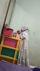 Morning makeup routine in a Cilacap home