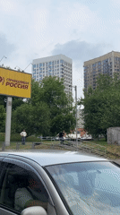 Krasnoyarsk street corner near a political party billboard