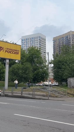 Krasnoyarsk street corner near a political party billboard