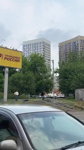 Krasnoyarsk street corner near a political party billboard