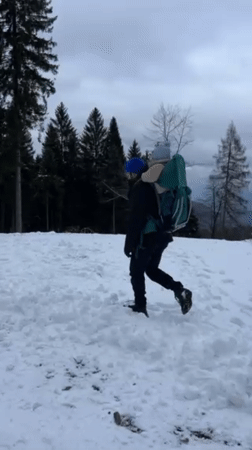 Family enjoys winter walk with young children in snowy Bellagio