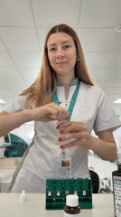 Lab technician conducts routine testing at Moscow medical facility