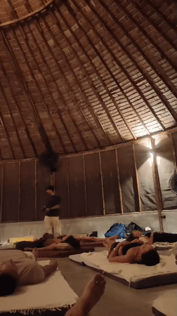 Sound bath session in a thatched pavilion, Ko Samui