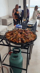 Seafood paella prepared for group dining in Thailand