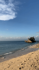 Peaceful morning beach scene captured at Kuta Selatan