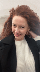 Woman films selfie video in Saint Petersburg public space