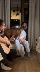 Casual dinner gathering documented in Tbilisi living room