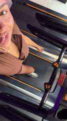 Woman exercises, films workout selfie at Moscow gym