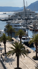 Marina activity documented in Tivat, Montenegro during sunny afternoon