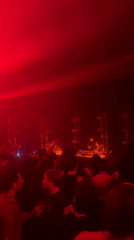 DJ performs at red-lit club venue in Yerevan