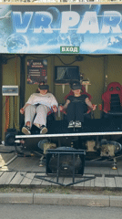 Adult and child enjoy VR experience in Chaikovsky park