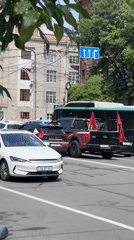 Vehicle convoy with police stops on Yerevan street