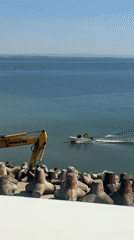 Morning construction and boat activity observed in Burgas harbor