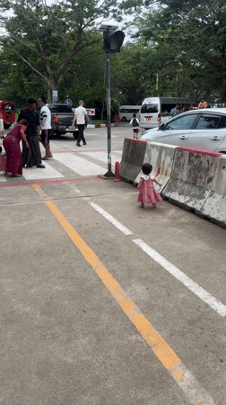 Early morning gathering at Chalong cafe and crosswalk