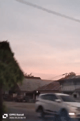 Dusk street scene captured in Indonesian town