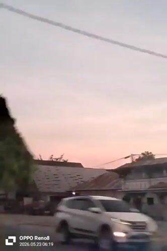 Dusk street scene captured in Indonesian town