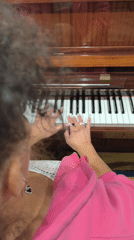 Hands on piano keys, both working simultaneously in Hrodna