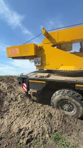 Crane truck stuck in mud in Tyumen, Russia