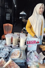 Food stall cashier counter in a Lhokseumawe market