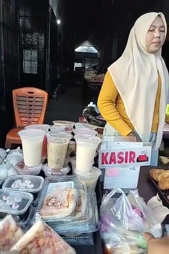 Food stall cashier counter in a Lhokseumawe market