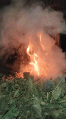 Nighttime leaf fire burning outdoors in Lhokseumawe