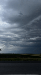 Storm approaches rural Serbian countryside near Perlez