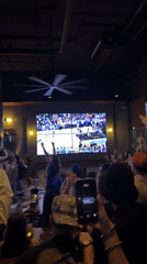 Basketball watch party at NYC bar draws enthusiastic crowd