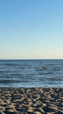 Jet skis and swimmers share the Adriatic at Donji Štoj