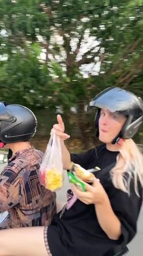 Daily life moments captured in Thai suburban neighborhood