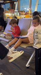 Kids killing time at Phuket Airport departures