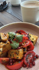 Riverside meal documented in Nizhnekayancha featuring eggplant and scenic views