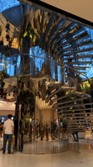 Modern NYC retail store interior with spiral staircase documented