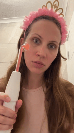 Woman Documents Skincare Routine with Facial Wand in Turkey