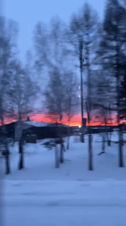 Vibrant winter sunset observed in Pokosnoe, Russia