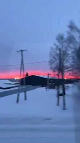 Vibrant winter sunset observed in Pokosnoe, Russia