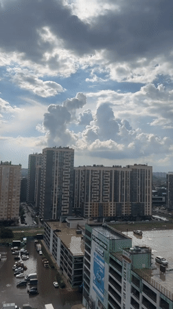 Afternoon scenes from Krasnodar: cats, skyline views, dramatic clouds