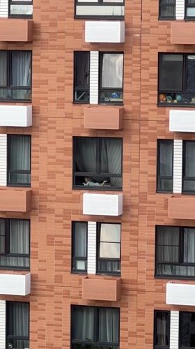 Residents observed in daily activities at Lyubertsy apartment building