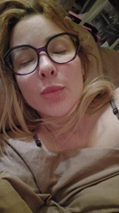 Morning domestic moments captured in Sochi bedroom setting