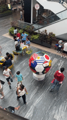 Soccer ball sculpture draws crowds at Puebla shopping mall