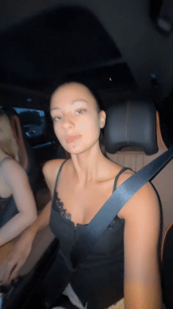 Women record selfie video while driving in Rawai, Thailand