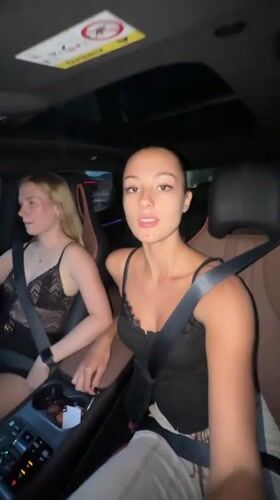 Women record selfie video while driving in Rawai, Thailand