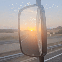 Truck driver captures golden sunrise highway view near Estaràs