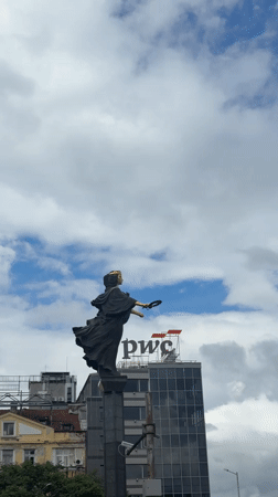Saint Sofia statue observed in central Sofia amid urban backdrop