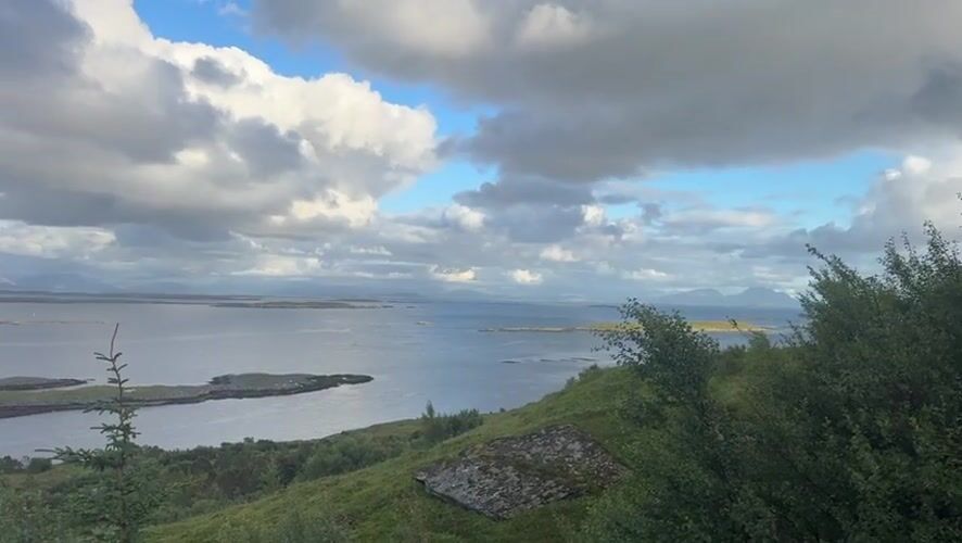 Hiking Lovund mountain with sweeping coastal views