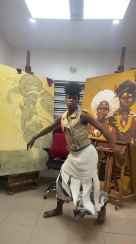 Artist documents creative session in Nigerian studio workspace