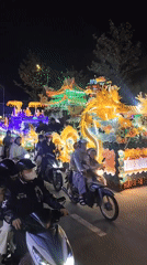 Buddhist procession with illuminated floats travels through Đà Lạt Vietnam