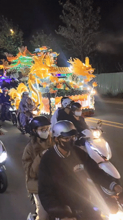 Buddhist procession with illuminated floats travels through Đà Lạt Vietnam