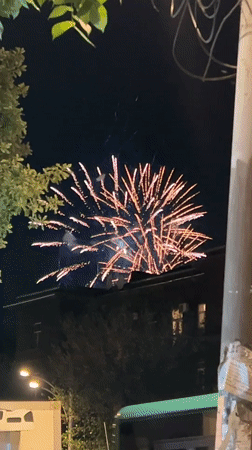 Evening scenes documented across Yerevan include fireworks, statues, roses