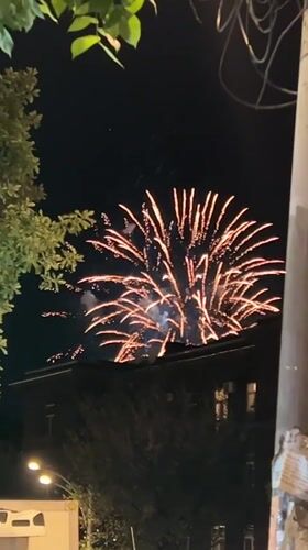 Evening scenes documented across Yerevan include fireworks, statues, roses